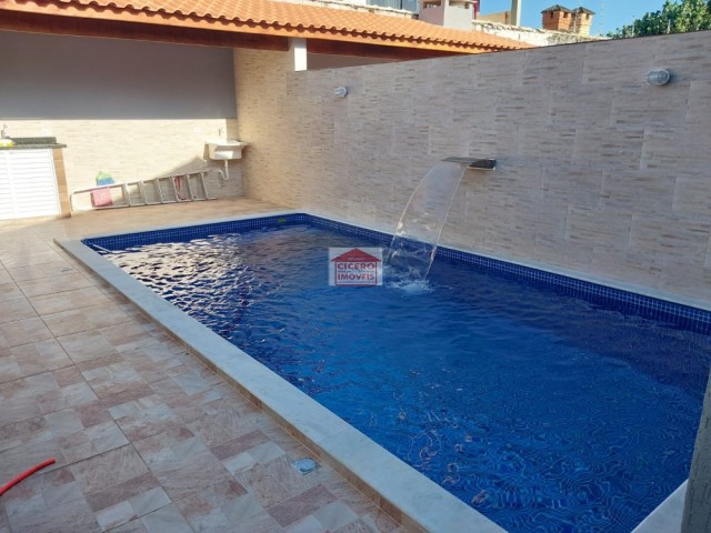 linda casa com piscina